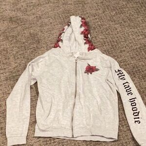 Decorative, feminine zip up hoodie